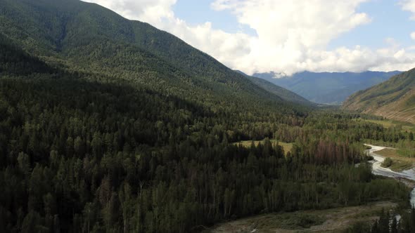 Aerial view from on valley and mountains of Ak-Kem with river Katun in Altai