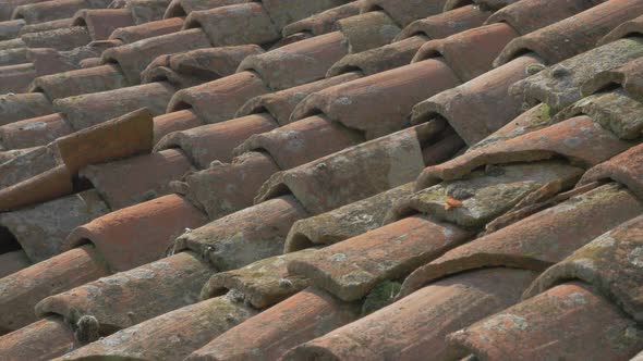 Old clay roof top materials 4K 2160p UHD footage - Panning over ancient roof top 4K 3840X2160 UHD vi alt