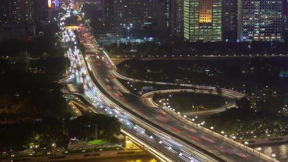 Guangzhou Bridge Night Highway Traffic Aerial Cityscape Panorama China Timelapse Pan Up alt