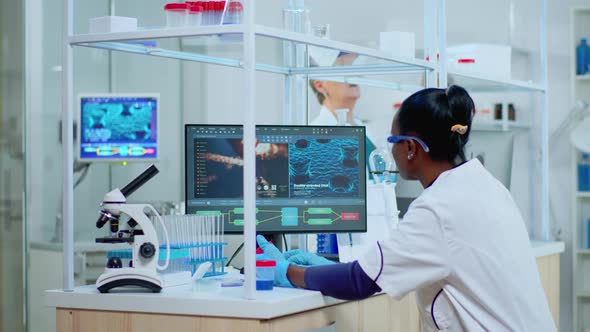 Black Woman Researcher Carrying Out Scientific Research in Lab alt