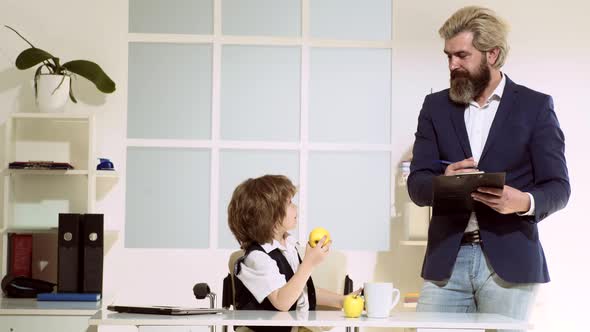 Business Partners Little Child Businessman and His Older Mentor. Team Job. Funny Kids. Future alt