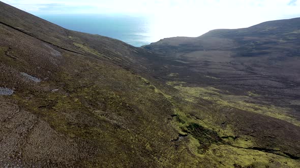 Aerial View of the Beautiful Coast at Malin Beg with Slieve League in the Background in County alt