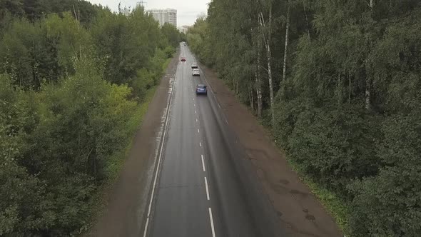 Drone Footage Of Car Driving Through Forest Road Aerial Travel Countryside