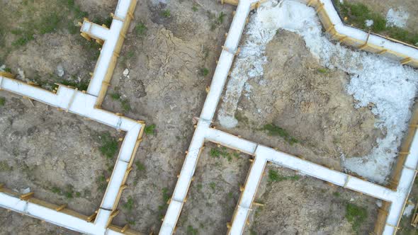 Aerial View of Building Works of New House Concrete Foundation on Construction Site alt