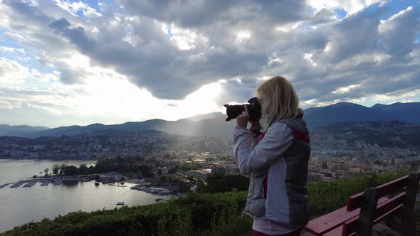 Photographer Woman By Lugano Skyline alt