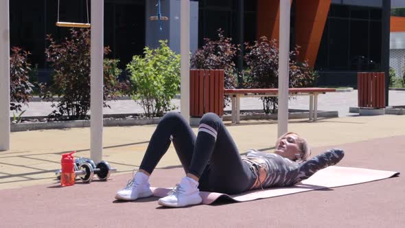 Woman's outdoor workout in summer