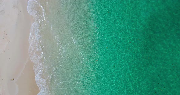 Top down view beach and sea. Aerial view of drone crystal seawater wave alt