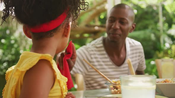 African American woman spending time in garden alt