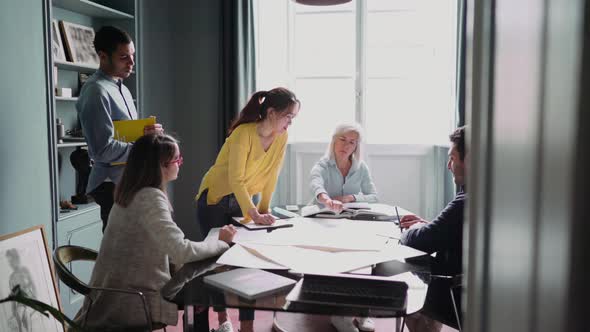 Business people having a meeting in the office alt