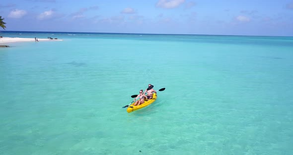 Happy people on romantic honeymoon live the dream on beach on summer white sandy 4K background alt