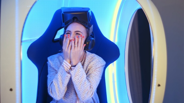 Amazed young woman left speechless after virtual reality session