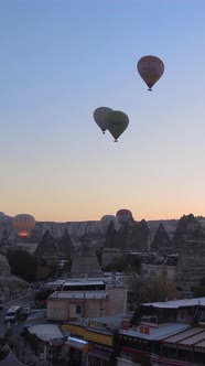 Vertical Video of Hot Air Balloons Flying in the Sky Over Cappadocia Turkey alt