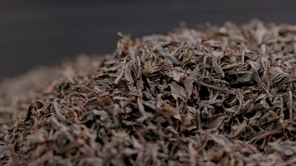 Looped Spinning Dry Black Tea Full Frame Closeup Background