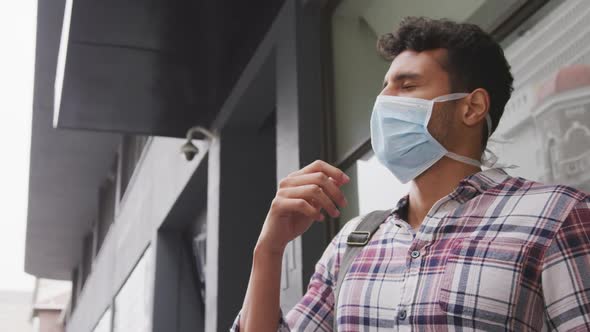 Side view of Caucasian man wearing a corovirus covid19 mask alt