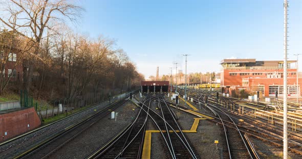 Time lapse of train yard, repair and cleaning depot of public transport underground line in 4k alt