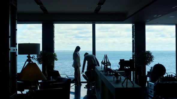 Partners Silhouettes Working Panorama Window alt