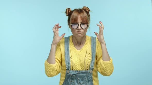 Annoyed and Pressured Hipster Girl Showing Head Explosion Gesture Boiling with Anger and Looking