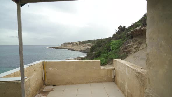 Rainy Day in Beautiful Stone Beach Il-Kalanka in Malta alt