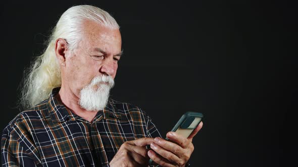 Man Watching Something On The Phone On The Internet alt