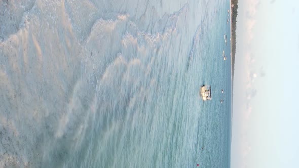 Vertical Video of the Beach on Zanzibar Island Tanzania Aerial View alt