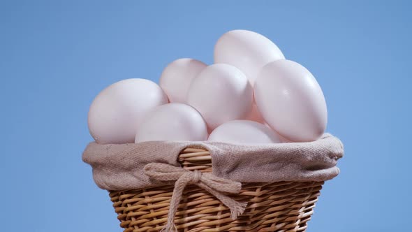 Chicken Eggs in the Basket Rotating Shot Chicken White Fresh Raw Eggs in an Egg Container alt