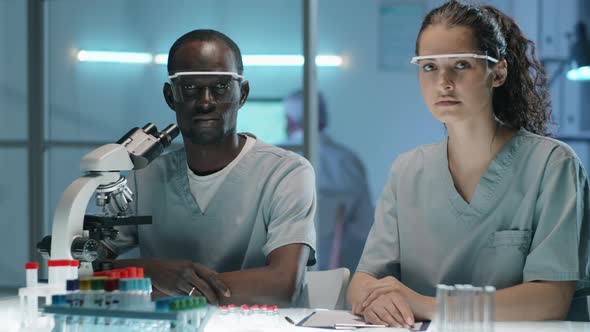 Portrait of Multiethnic Male and Female Scientists in Lab alt