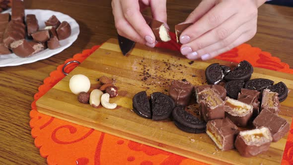 Pieces of chocolate bars and cookies alt