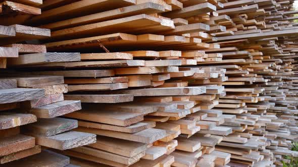 Sawn Boards in a Stack. Lumber at a Sawmill or Building
