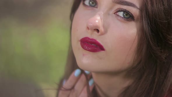 Seductive Woman Thoughtfully and Invitingly Looking Along alt