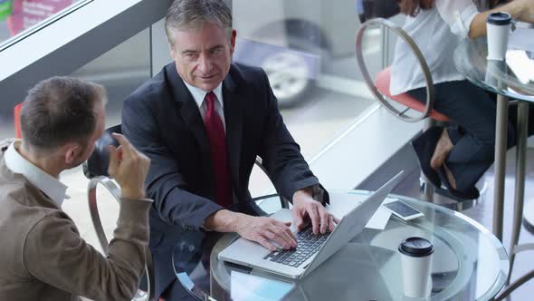 Business people meeting in office lobby