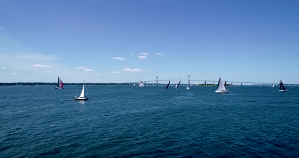 Sailboats entering and leaving Mt. Hope Bay in Newport Rhode Island as well as returning from Block alt