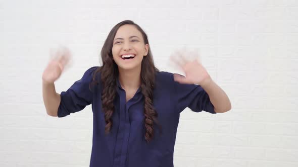 Indian girl saying Hi alt