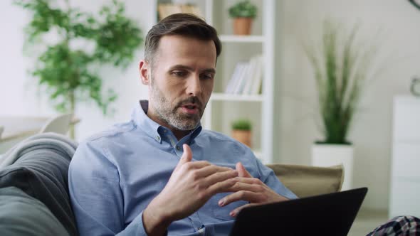 Video of man gesturing during a video conference. Shot with RED helium camera in 8K. alt