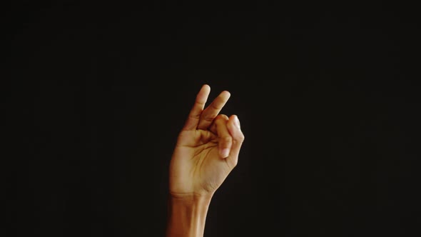 African American Man Counting Fingers Isolated on Black Background alt