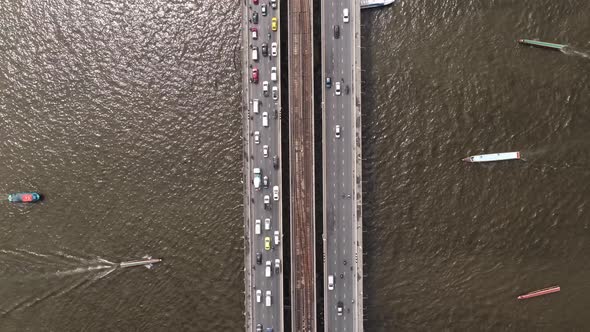 4k Time lapse, Top view of the Chao Phraya River, Traffic of cars and boats. alt