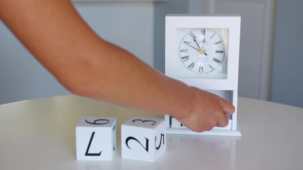 Change the Date on the Wooden Calendar on 31 December Happy New Year alt