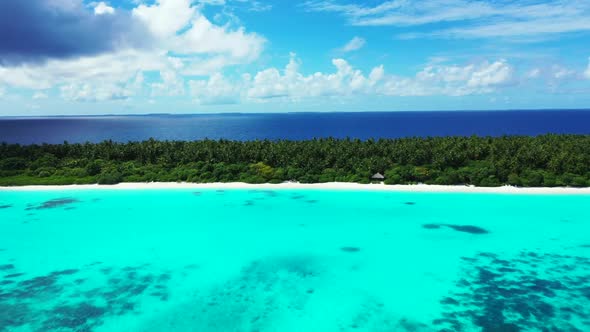 Aerial top down sky of tranquil coastline beach trip by turquoise ocean with white sand background o alt