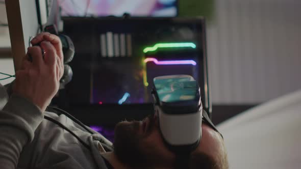 Vertical Video Pro Cyber Sport Gamer Wining Playing Video Games Using Vr Headset alt