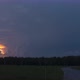 Stormy Weather Rain Clouds Timelapse at Sunrise Over Green Meadow - VideoHive Item for Sale