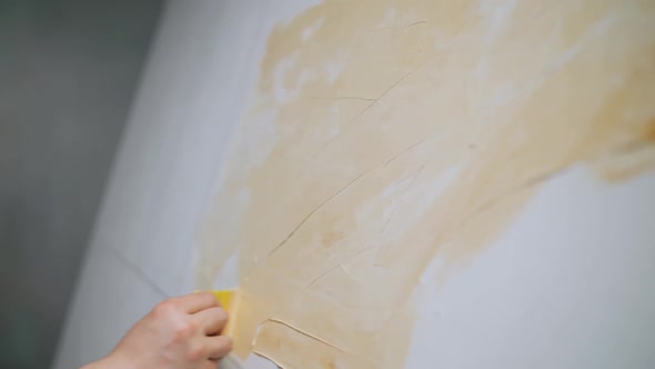Slow Motion Creative Person at Work a Talented Adult Man Artist Covers the Canvas with Beige Oil alt