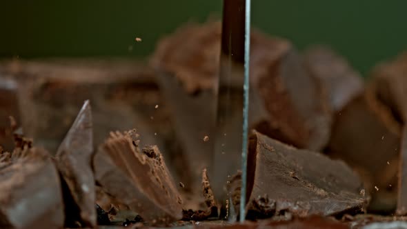 Super Slow Motion Shot of Cutting Raw Chocolate Chunk at 1000 Fps alt