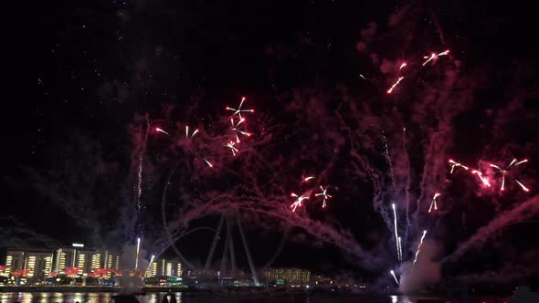 Fireworks on the Background of the Wheel