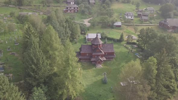 Old wooden Orthodox church in mountain village Kryvorivnia in Ukrainian Carpathians mountains