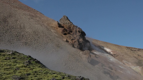 Environment. Iceland. Geyser in famous tourist attraction. Steam from fumarole in geothermal area. alt