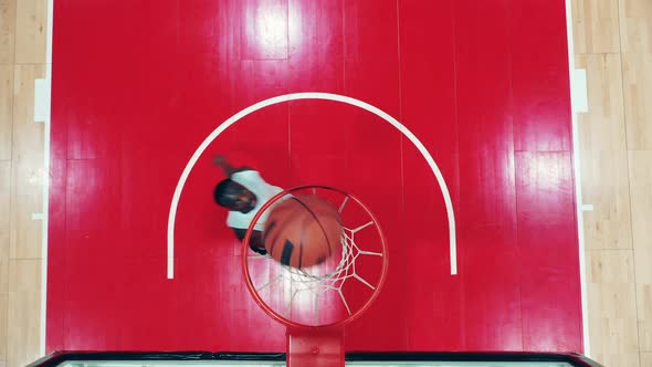 African Athlete is Missing the Basket While Throwing the Ball alt