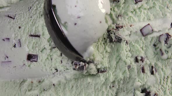 Top View of Mint Flavour Ice Cream with Chocolate Flakes and Scoop