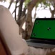 No Faces View of Green Screen Laptop Display on Tropical Beach Location - VideoHive Item for Sale