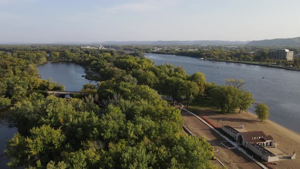 Mississippi River valley in summer. beach and beach house along the shore. Islands of trees.