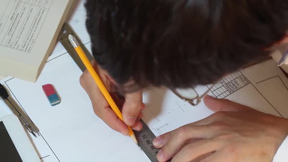 Student Engineer Working On Drawing