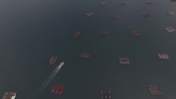 Aerial Boat Between aquaculture alt